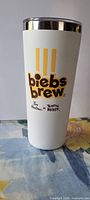 White Tim Hortons Biebs Brew travel mug front logo view
