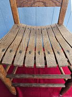 Top view showing six narrow seat slats and wear
