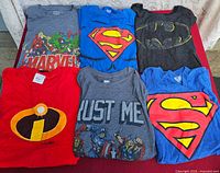 All six T-shirts laid out front side up