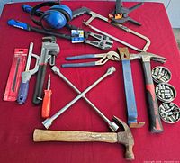 All tools laid out on red surface