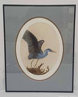 Full view of framed lithograph with mat and frame