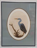 Full view of framed lithograph showing heron artwork