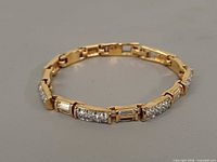 Top view of bracelet showing crystal-set links and clasp