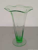 front view of green depression glass vase