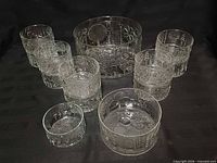Full set showing large bowl with surrounding smaller bowls