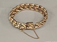 Full view of gold-filled Rhythm link bracelet in closed loop