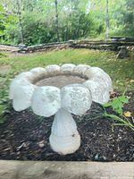 bird bath front three-quarter view showing basin and pedestal