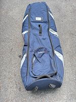 Full view of navy Founders Club rolling golf travel bag