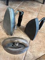 All three sad irons grouped