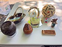 All eight décor and collectible items laid out on table