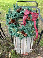 Front view of sled with wreath attached