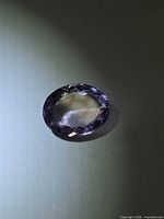 Oval faceted pink-purple amethyst front view