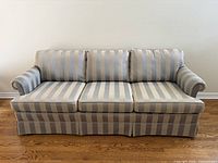 front view of striped three-seat sofa