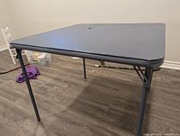 Table unfolded showing legs and general condition