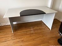 Full front view of desk showing writing pad