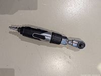 Left side view of Mastercraft air ratchet showing composite grip and quick-connect fitting