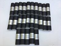 Front view of 25 cylindrical cases