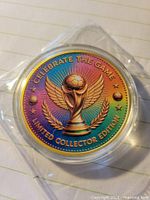 Obverse of enameled medallion showing trophy and text