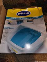Front of box showing Foot Spa Plus image and branding