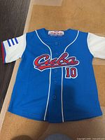 Front view of blue and white Cuba jersey with number 10