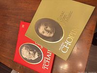 Front covers of both vinyl box sets showing portraits and titles