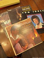 All four LPs laid out showing front sleeves