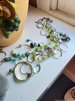 All jewelry items laid out showing quantity and colour palette