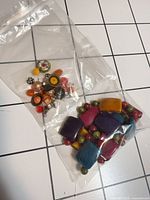 Two separate clear bags containing all pieces in lot