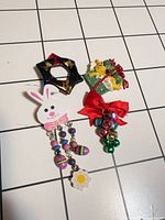 All four holiday brooch pins front view
