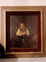 frontal view of framed reproduction
