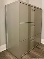 Perspective view of filing cabinet showing side and front