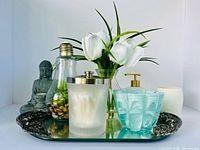 Group shot of all bathroom items on mirror tray