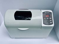 Top view of closed Philips bread maker showing control panel and viewing window