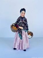 Front view of Royal Doulton The Orange Lady figurine