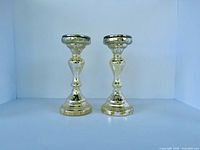 Pair of silver mercury glass candle holders front view