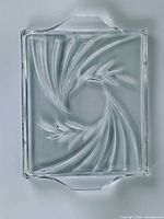 Top view showing full rectangular platter and swirl leaf design
