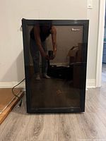 Front view of Magic Chef wine fridge closed