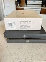 Three product boxes: one Carlton, two Bowring