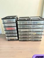 Front view of all three plastic drawer units