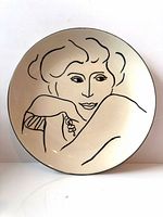Front view of Sango Francesca plate showing full black line portrait design