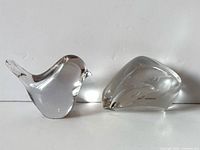 Both glass figurines side by side for size and comparison