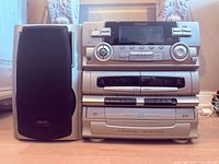 Front view of TEAC DC-D2850 main unit with included speaker