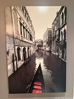 Front view of entire canvas showing Venetian canal scene with red gondola seats
