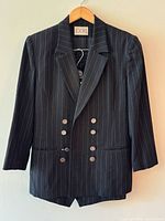 Front view of blazer on hanger