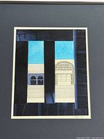Front view of framed collage showing composition and framing