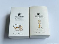 Two Swarovski Crystal Memories Classics boxes for still and movie camera figurines