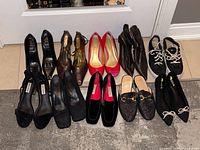 Single image showing all twelve pairs of women’s shoes
