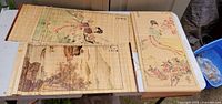 All three bamboo scrolls laid out showing designs