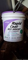 Front view of Lafarge Rapid Coat Mid Weight Joint Compound tub
