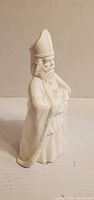 Front view of unpainted ceramic king figurine